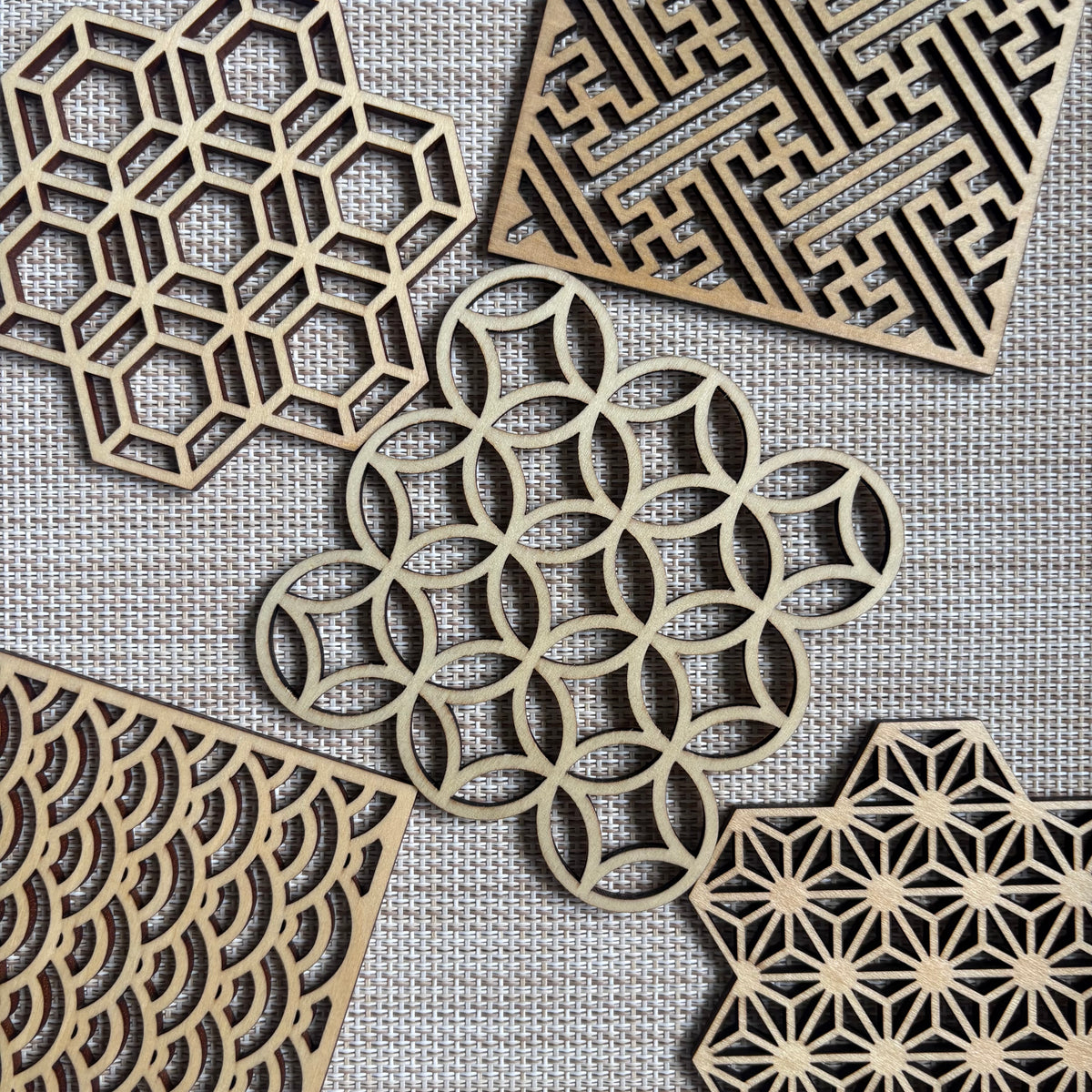 Five Blessings coaster set — all five auspicious patterns arranged together