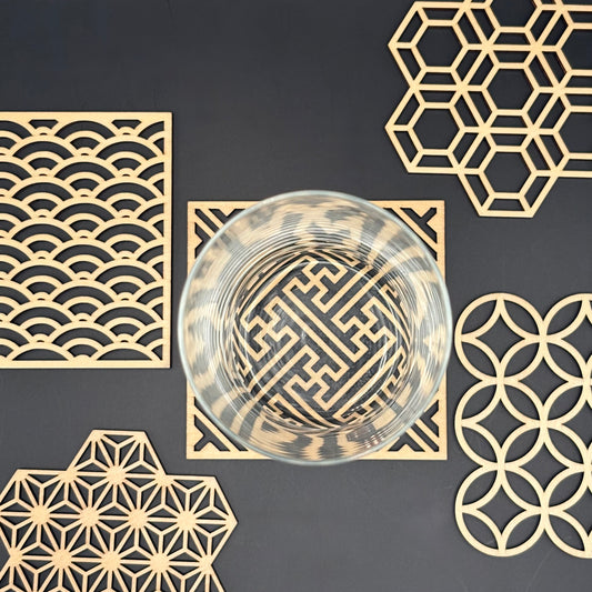 Five Blessings coaster in use, glass resting on the Shippou (interlocking circles) pattern